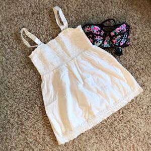 Cute white cover up! Lace eyelet detail on the hem